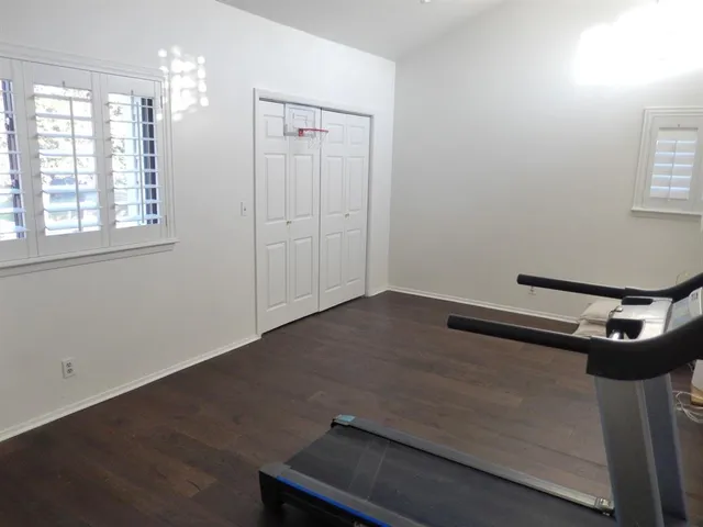 a view of a room with gym equipment