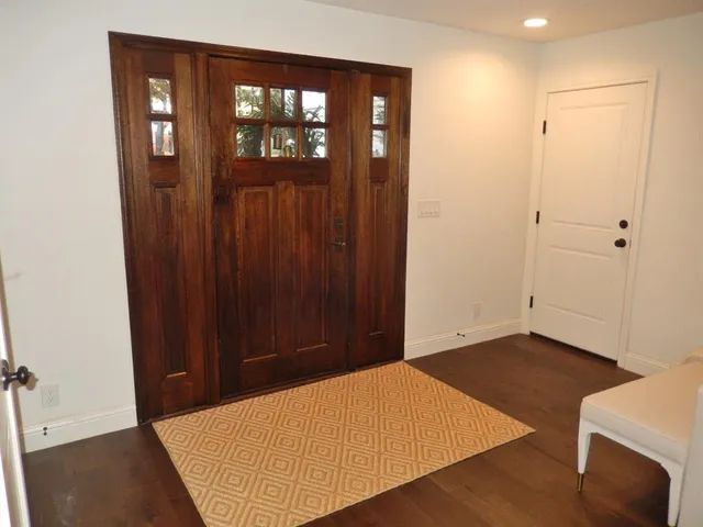 an empty room with closet area