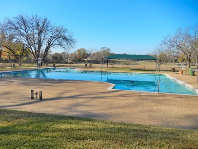 a view of a yard with an outdoor space