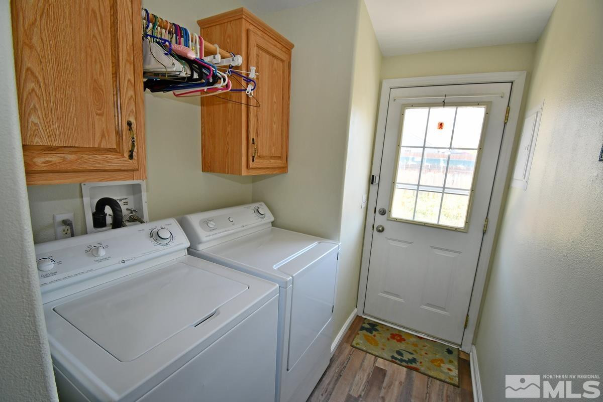 229 Mark Street Gardnerville, NV 89410 - Photo 17 of 24 a utility room with dryer and washer