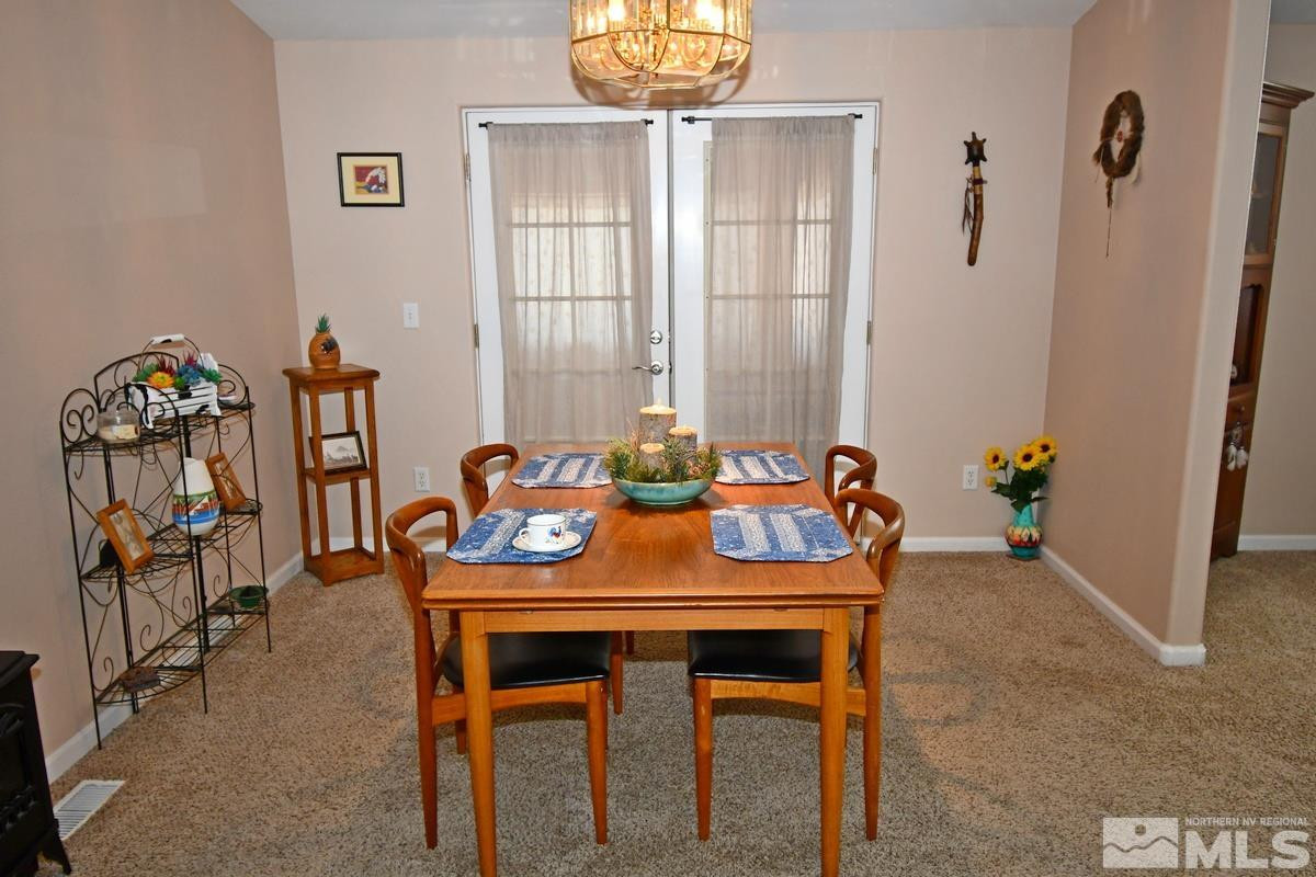 229 Mark Street Gardnerville, NV 89410 - Photo 6 of 24 a view of a dining room with furniture