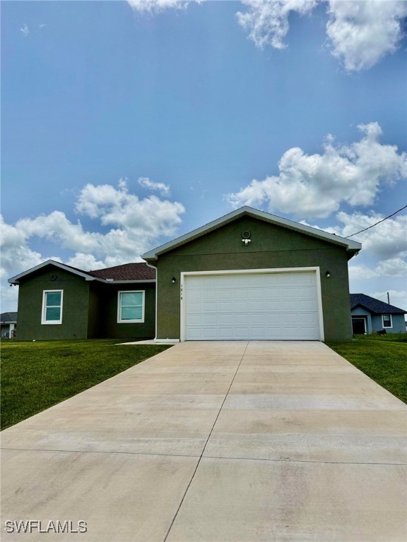 a front view of a house with yard