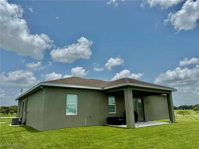 a house view with a garden space