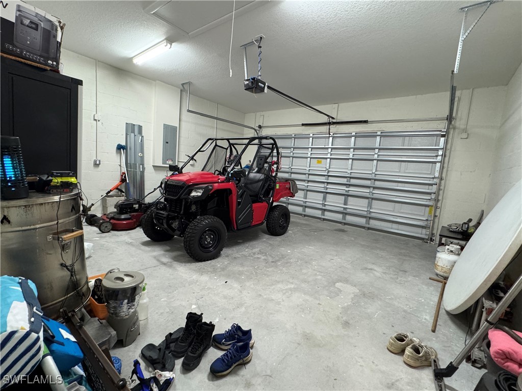 1818 Inwood Road LaBelle, FL 33935 - Photo 27 of 28 a room with storage and utility