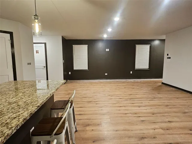 a view of a kitchen and living room