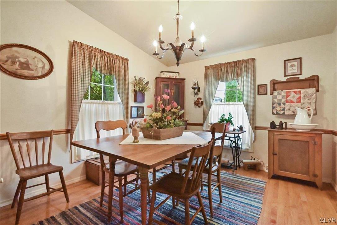 18 Abbey Road Easton, PA 18040 - Photo 12 of 30 a view of a dining room with furniture window and wooden floor