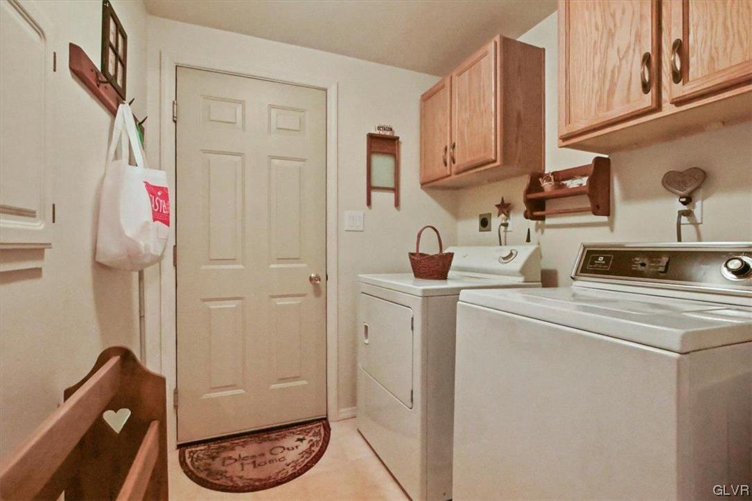 18 Abbey Road Easton, PA 18040 - Photo 19 of 30 a kitchen with a refrigerator and cabinets
