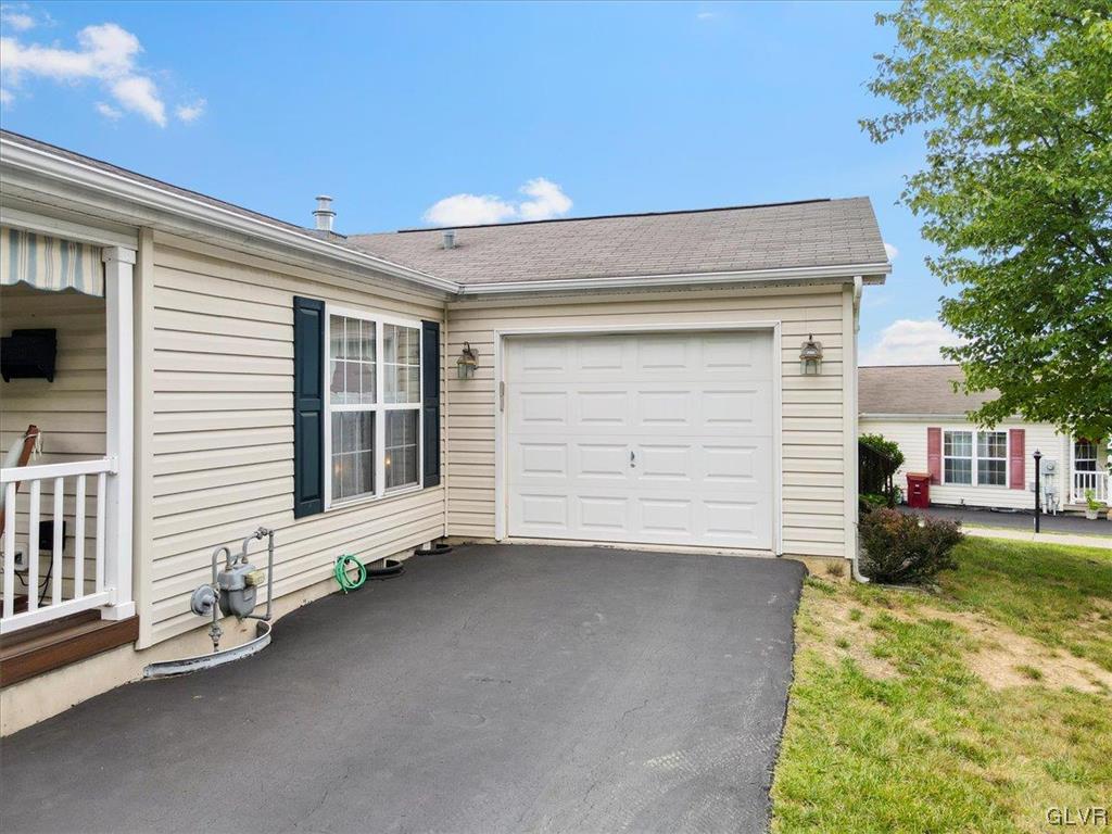 18 Abbey Road Easton, PA 18040 - Photo 23 of 30 a view of a house with a yard and garage