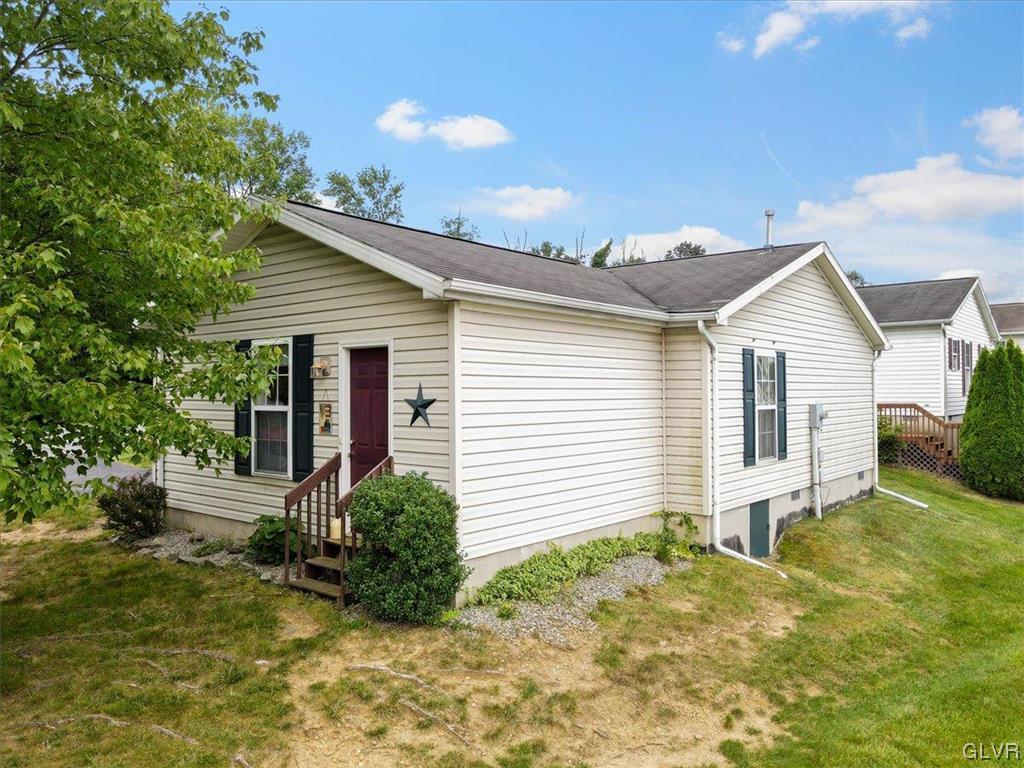 18 Abbey Road Easton, PA 18040 - Photo 25 of 30 a view of a house with a yard and potted plants