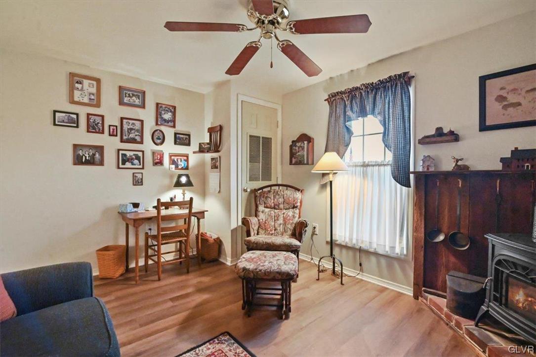 18 Abbey Road Easton, PA 18040 - Photo 3 of 30 a living room with furniture a flat screen tv and a wall paintings