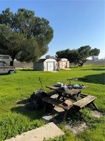 a view of a house with a garden