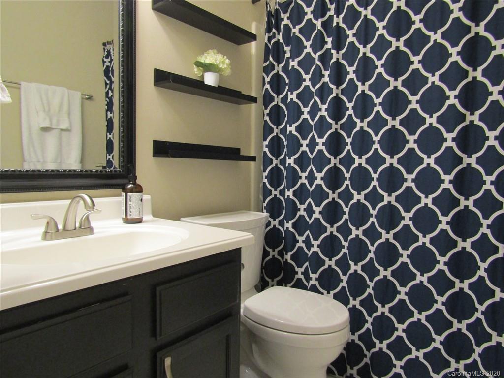 12820 Danby Road Indian Land, SC 29707 - Photo 11 of 21 a bathroom with a sink and a toilet
