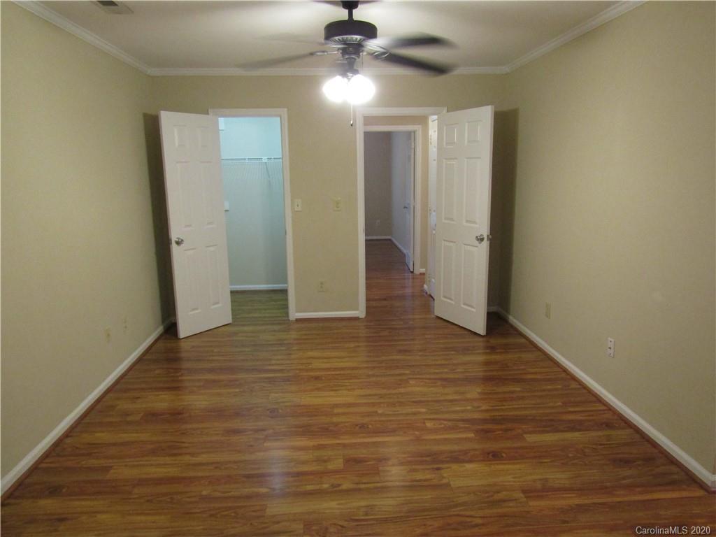 12820 Danby Road Indian Land, SC 29707 - Photo 15 of 21 a view of a hallway with wooden floor