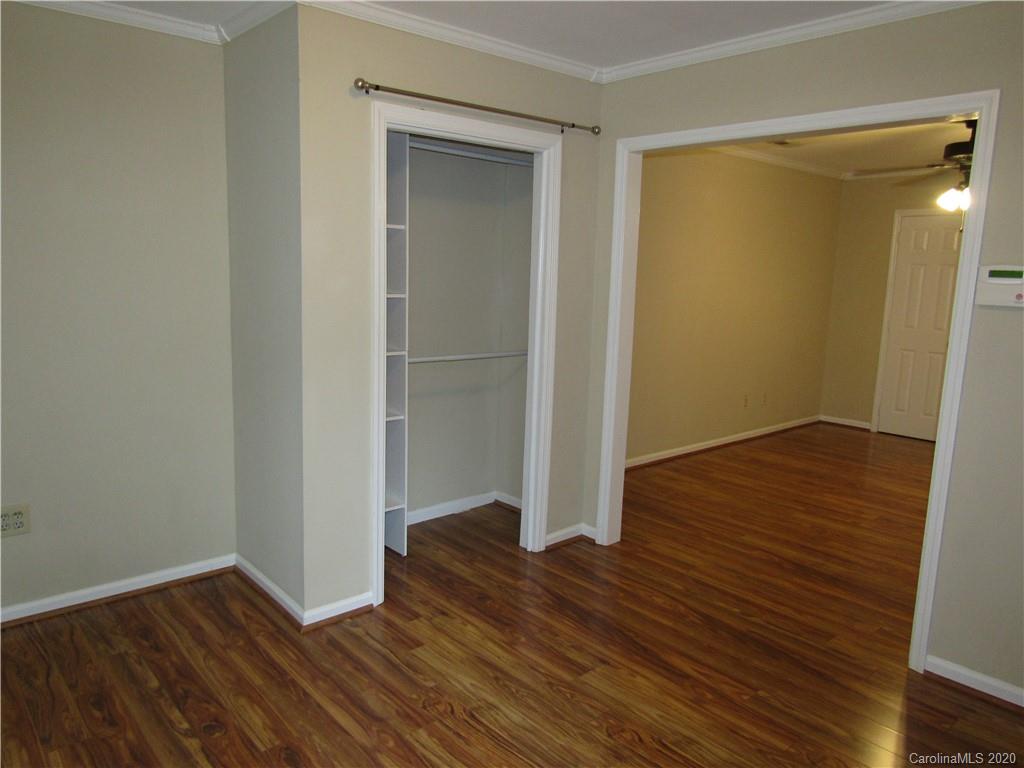 12820 Danby Road Indian Land, SC 29707 - Photo 16 of 21 an empty room with wooden floor and closet