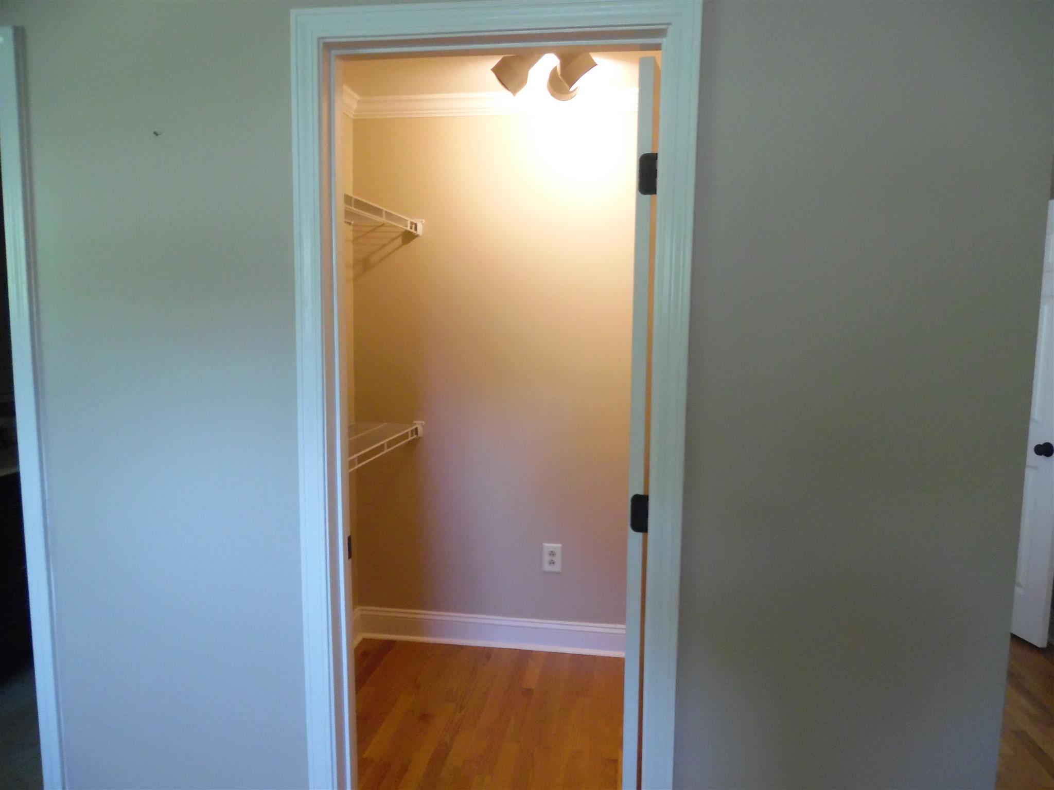1004 Springer Road Lawrenceburg, TN 38464 - Photo 12 of 20 WALKIN CLOSET IN MASTER BEDROOM
