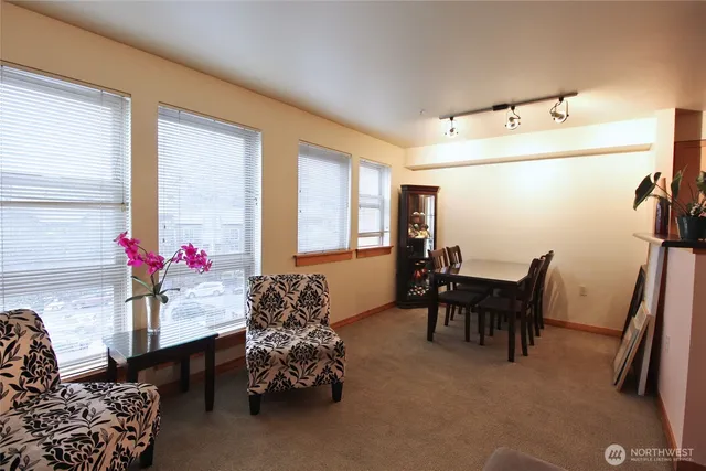 a bedroom with furniture and a window