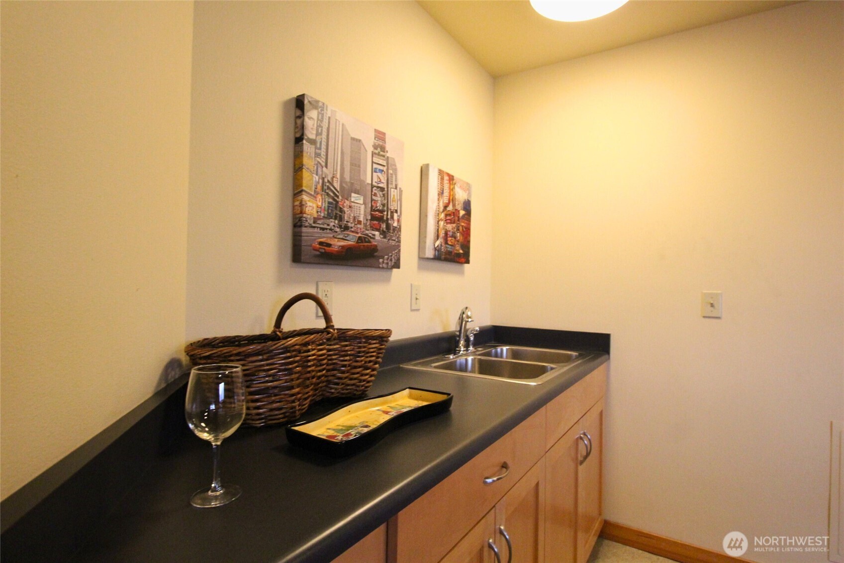 827 Hiawatha Place South, Unit 406 Seattle, WA 98144 - Photo 8 of 13 a bathroom with a sink and a mirror