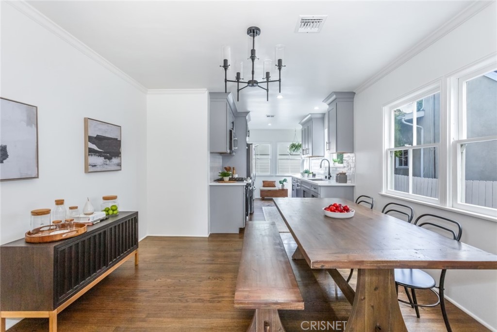 2091 West Mountain Street Glendale, CA 91201 - Photo 13 of 60 a view of a dining room with furniture and chandelier