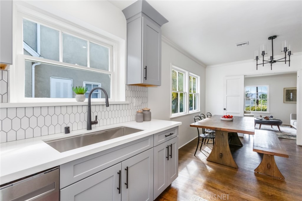 2091 West Mountain Street Glendale, CA 91201 - Photo 17 of 60 a room with a sink a table and chairs