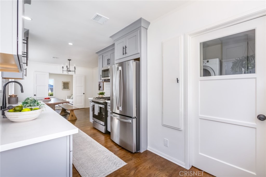 2091 West Mountain Street Glendale, CA 91201 - Photo 20 of 60 a kitchen with a refrigerator and a sink