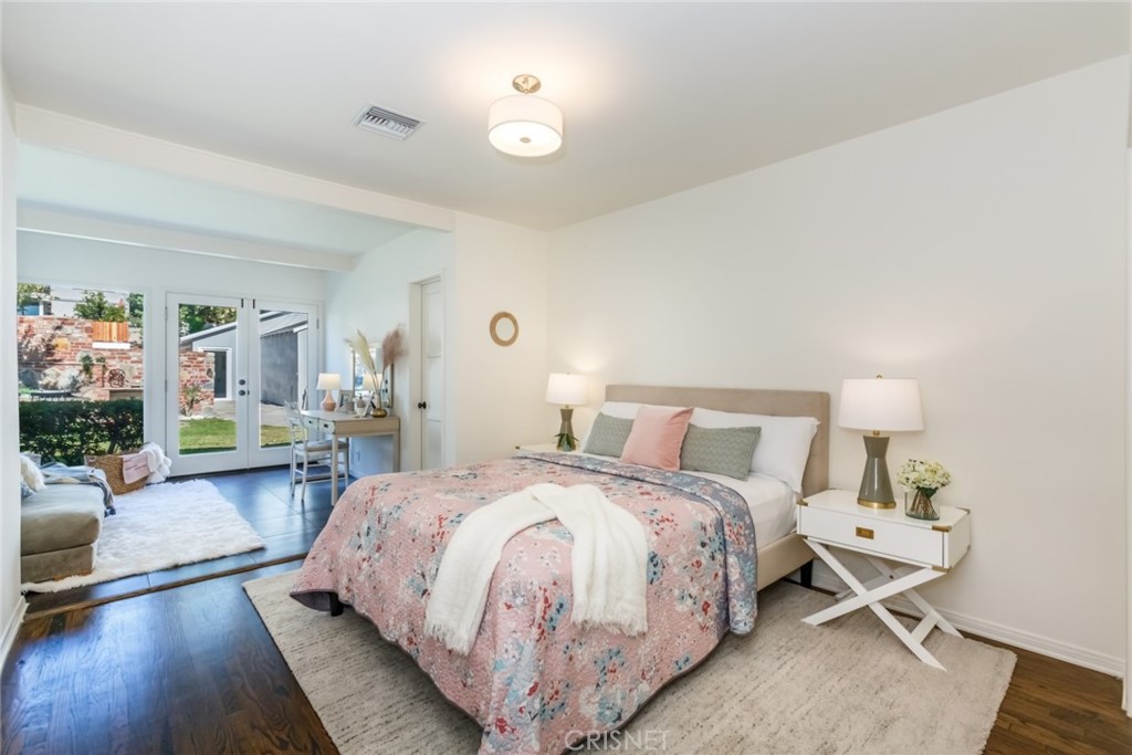 2091 West Mountain Street Glendale, CA 91201 - Photo 25 of 60 a bed room with a bed and a couch