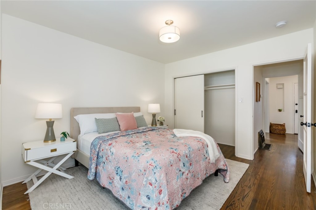2091 West Mountain Street Glendale, CA 91201 - Photo 27 of 60 a bedroom with a bed and wooden floor