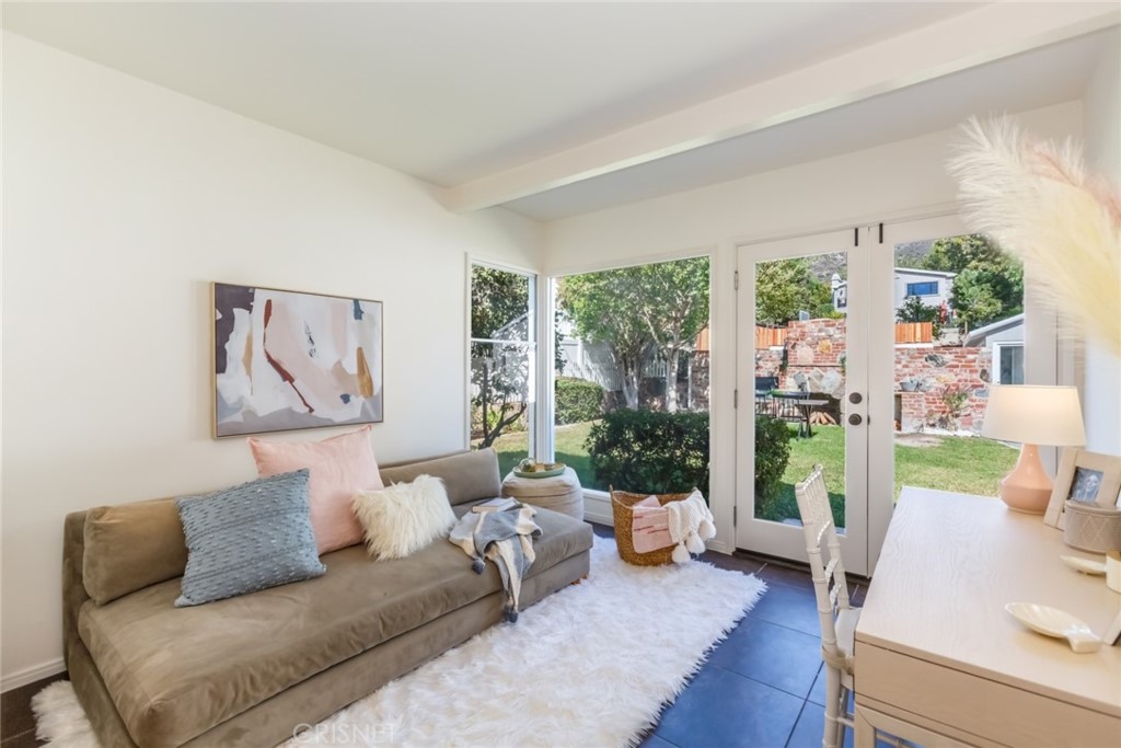 2091 West Mountain Street Glendale, CA 91201 - Photo 28 of 60 a living room with furniture and a large window