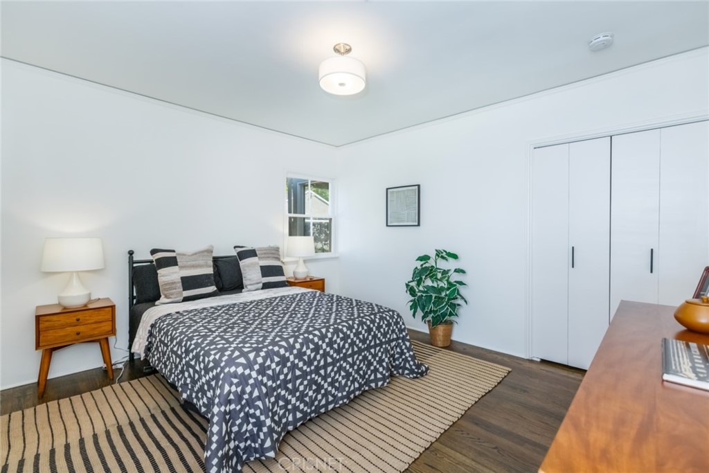 2091 West Mountain Street Glendale, CA 91201 - Photo 35 of 60 a bedroom with bed and wooden floor