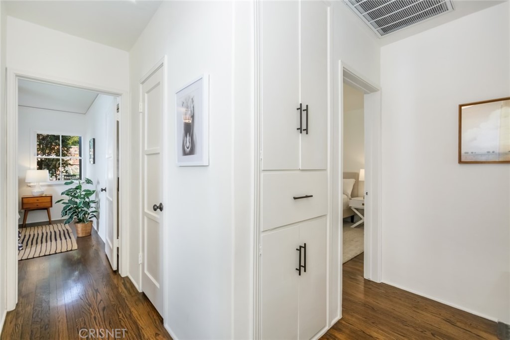 2091 West Mountain Street Glendale, CA 91201 - Photo 38 of 60 a view of a hallway with wooden floor and a living room