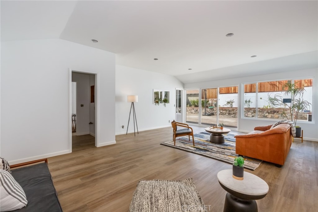 2091 West Mountain Street Glendale, CA 91201 - Photo 41 of 60 a living room with furniture and a potted plant