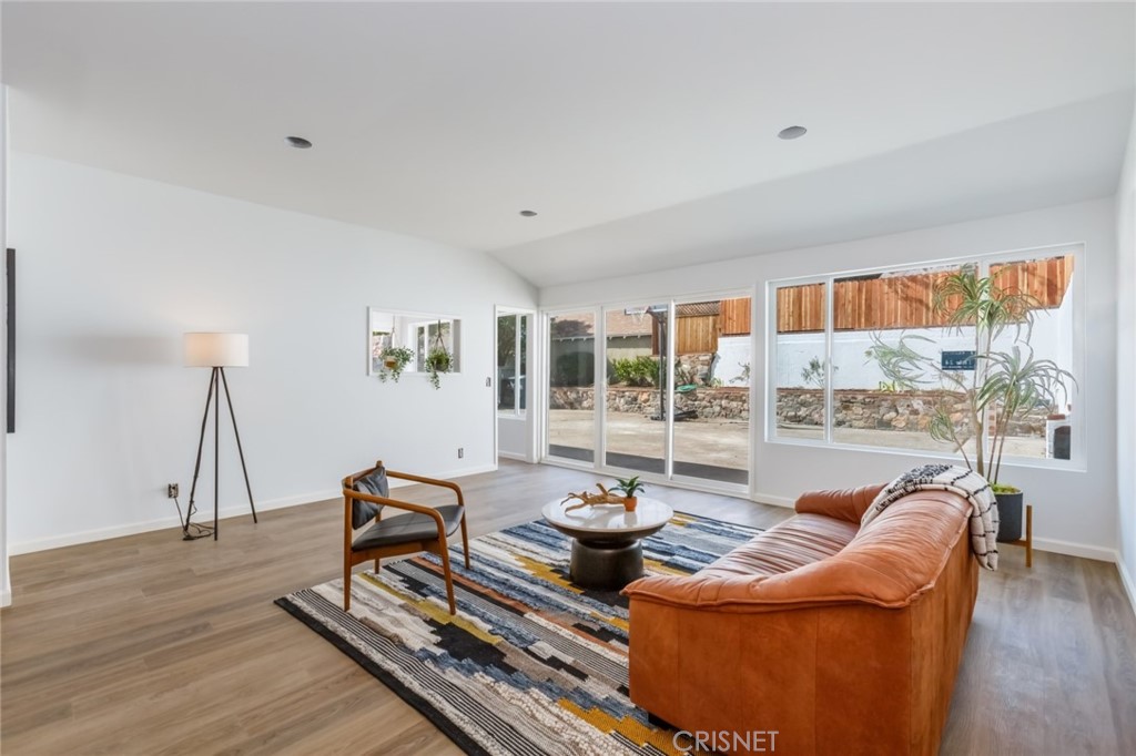 2091 West Mountain Street Glendale, CA 91201 - Photo 42 of 60 a living room with furniture and wooden floor