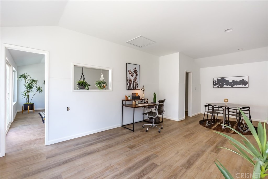 2091 West Mountain Street Glendale, CA 91201 - Photo 43 of 60 a view of a workspace with furniture and wooden floor