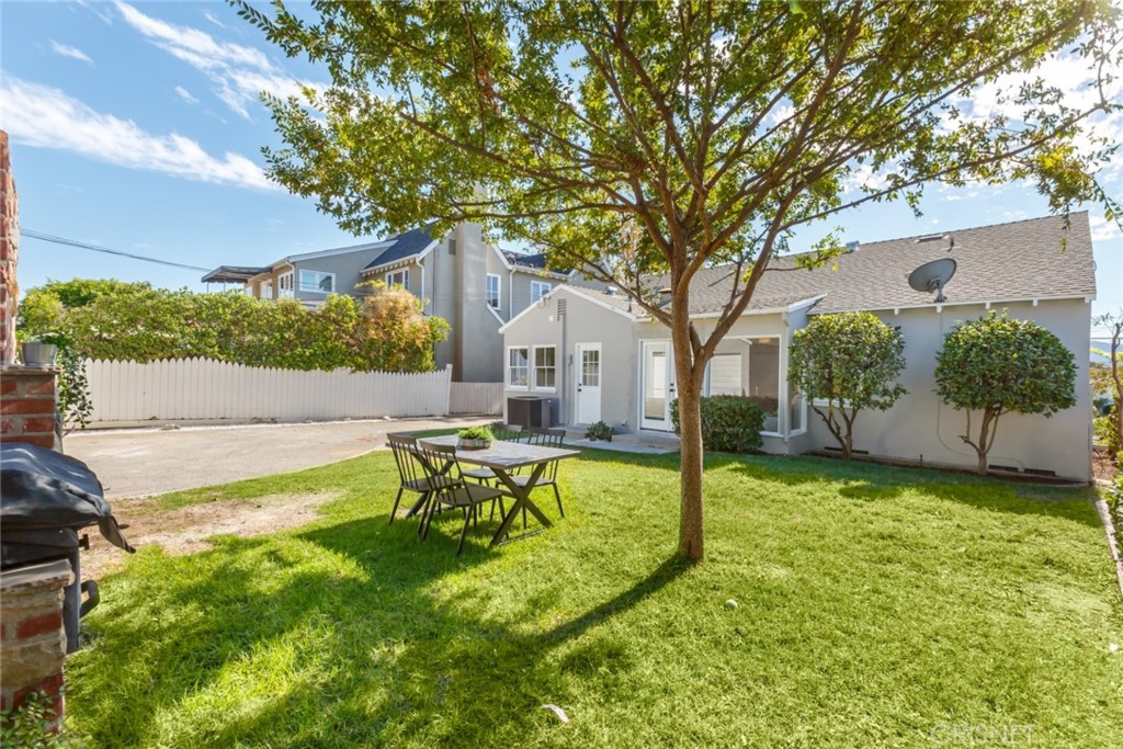 2091 West Mountain Street Glendale, CA 91201 - Photo 49 of 60 a view of a house with backyard and a tree