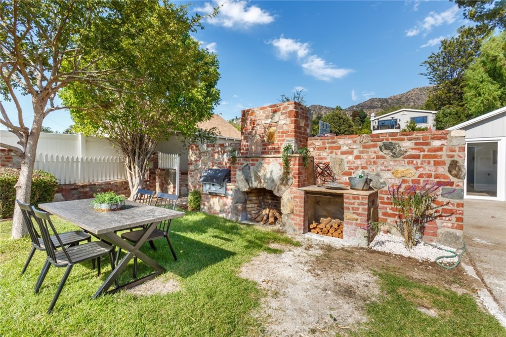 2091 West Mountain Street Glendale, CA 91201 - Photo 50 of 60 a view of a house with backyard and sitting area