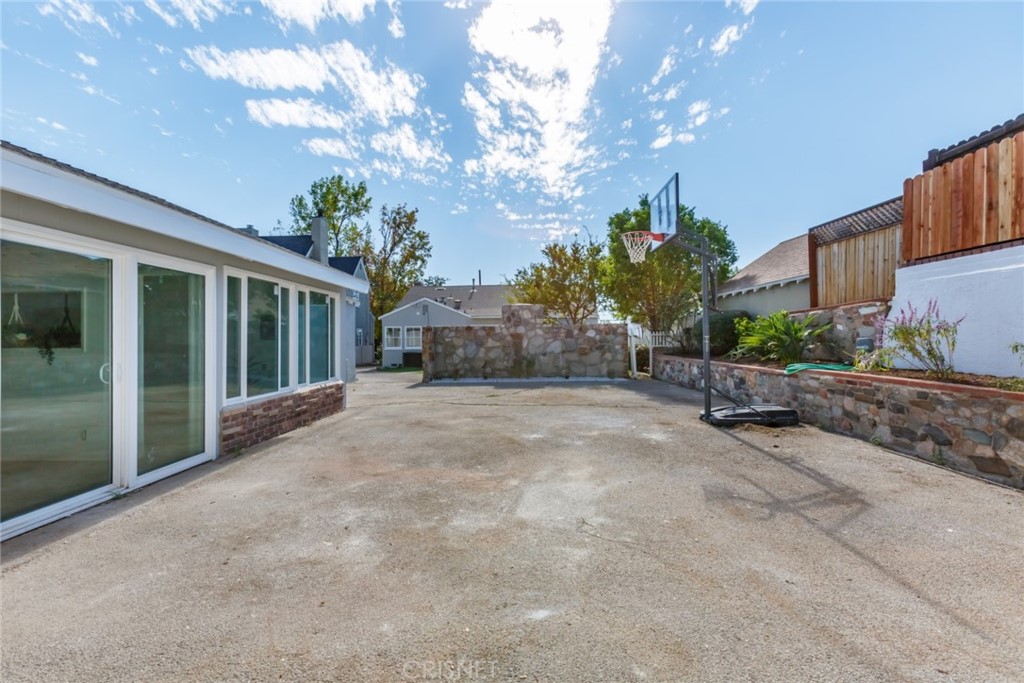 2091 West Mountain Street Glendale, CA 91201 - Photo 54 of 60 a view of a house with a yard and potted plants