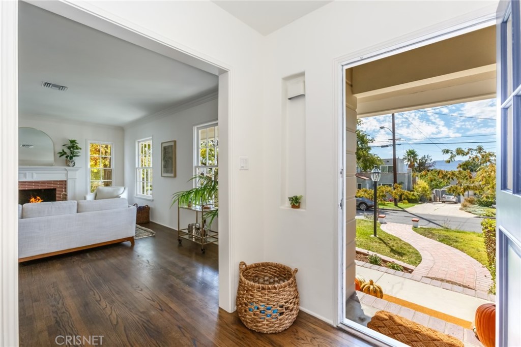 2091 West Mountain Street Glendale, CA 91201 - Photo 8 of 60 a living room with furniture and a large window