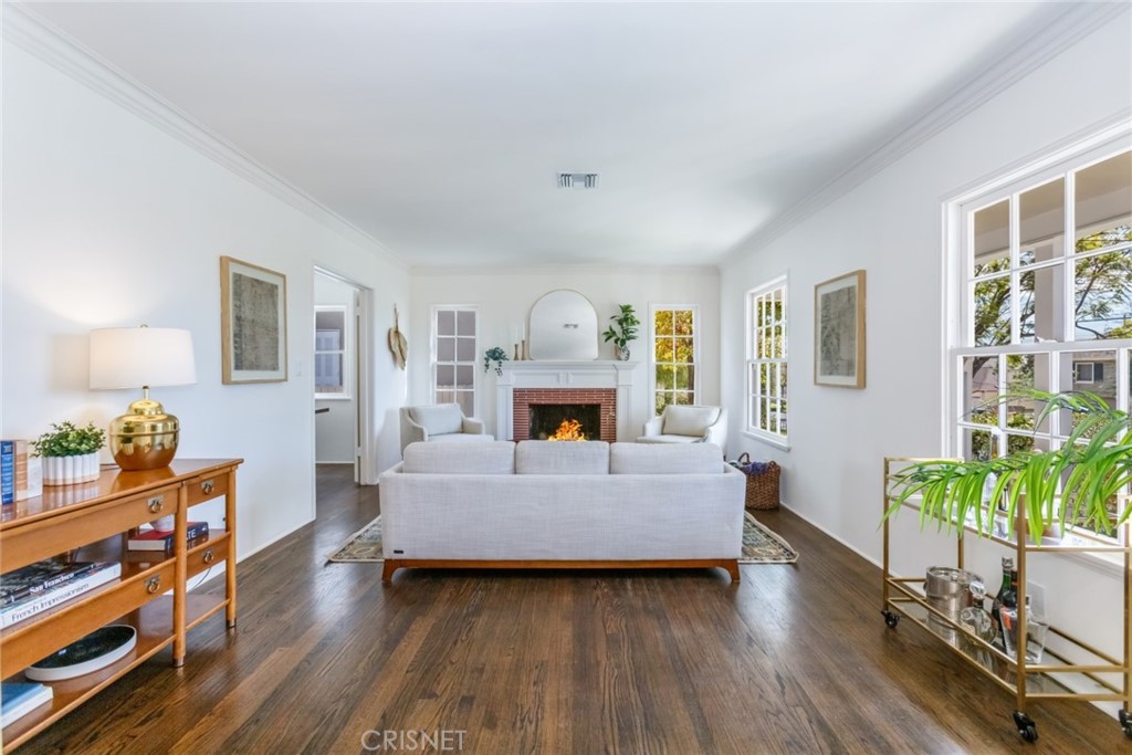 2091 West Mountain Street Glendale, CA 91201 - Photo 9 of 60 a living room with furniture and a fireplace