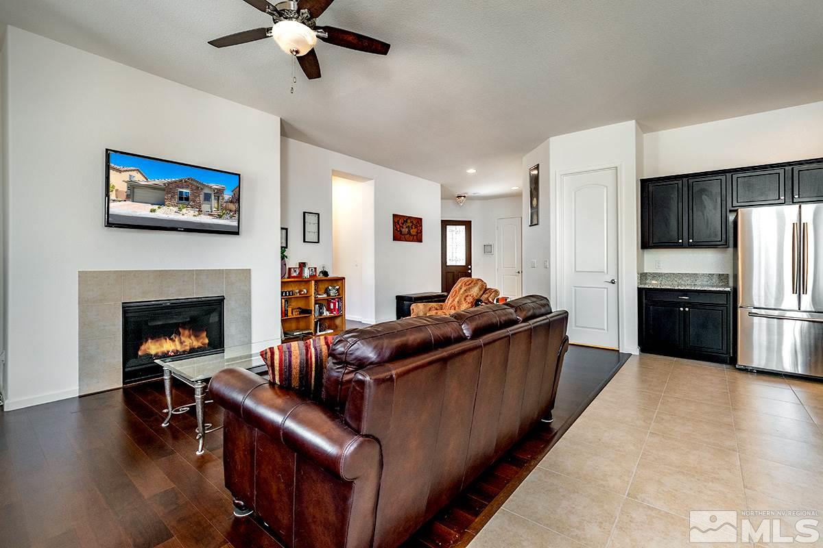 2750 Bonfire Lane Reno, NV 89521 - Photo 7 of 24 a living room with furniture and a fireplace