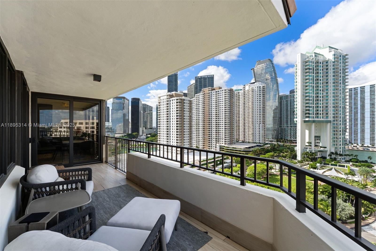 520 Brickell Key Drive, Unit A1716 Miami, FL 33131 - Photo 26 of 29 a view of a balcony with chairs