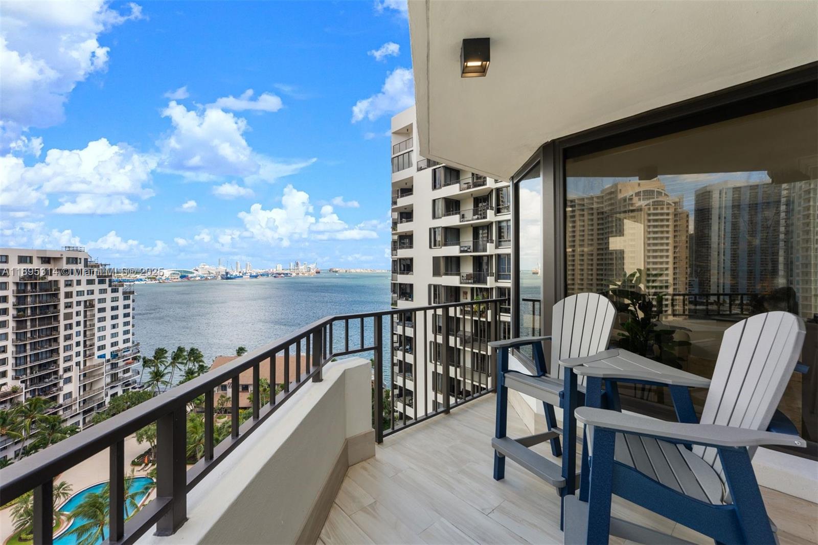 520 Brickell Key Drive, Unit A1716 Miami, FL 33131 - Photo 27 of 29 a view of balcony with a potted plant and outdoor seating