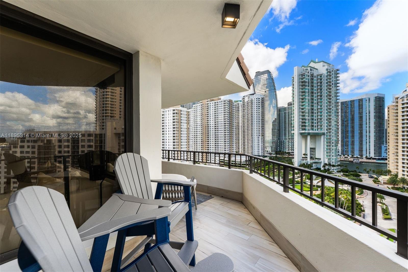 520 Brickell Key Drive, Unit A1716 Miami, FL 33131 - Photo 28 of 29 a view of a balcony with chairs