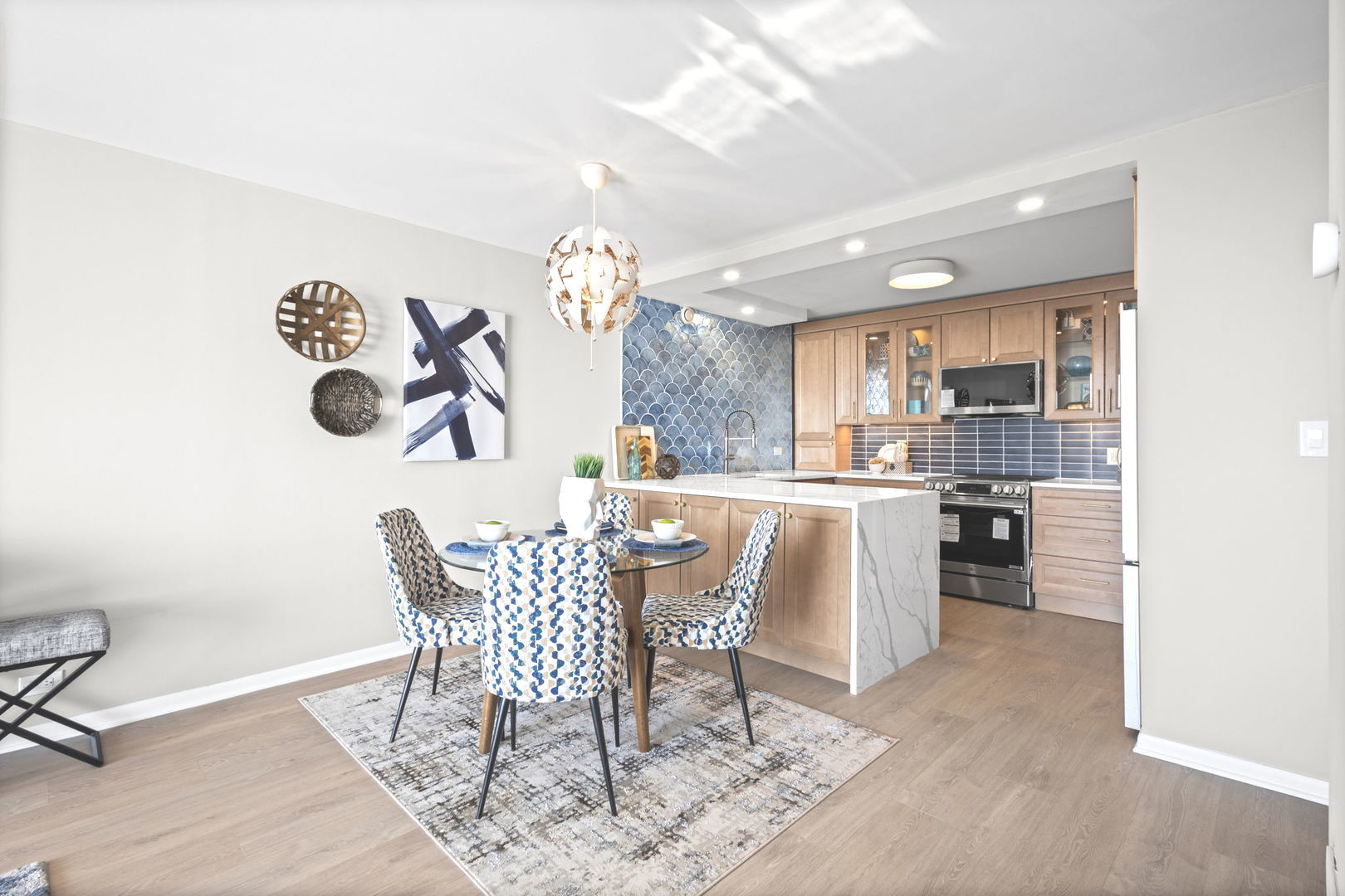 6007 North Sheridan Road, Unit 23G Chicago, IL 60660 - Photo 8 of 22 a dining room with furniture and a kitchen view