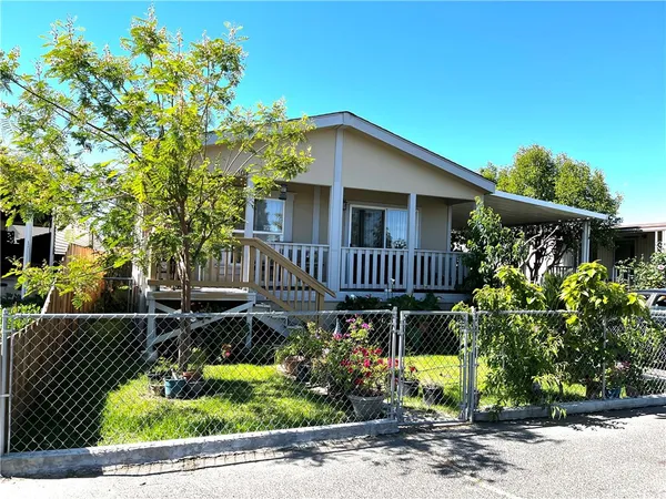 front view of a house with a small yard