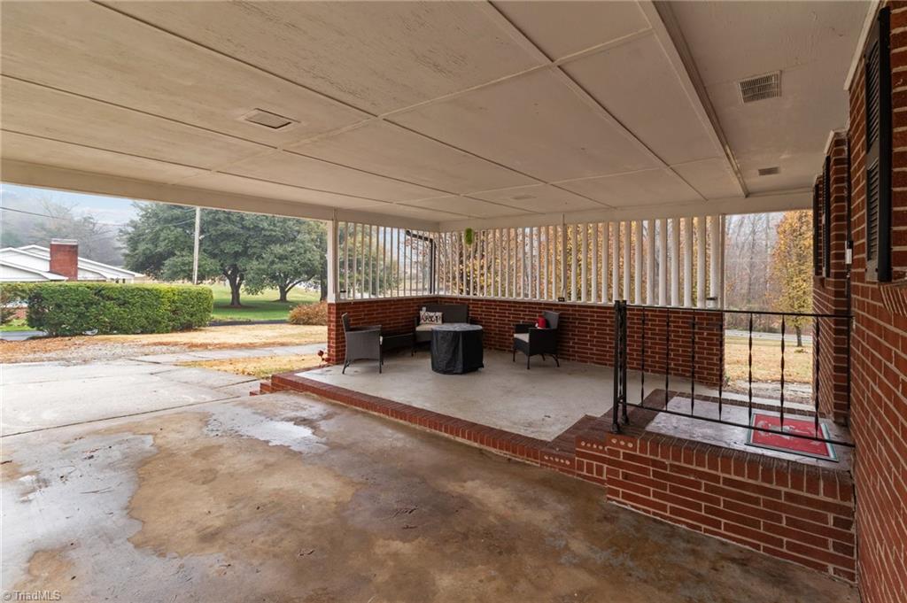 2057 Junction Road Cooleemee, NC 27014 - Photo 29 of 34 Covered carport patio