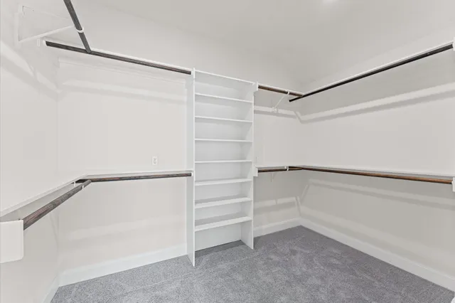a view of an empty walk in closet