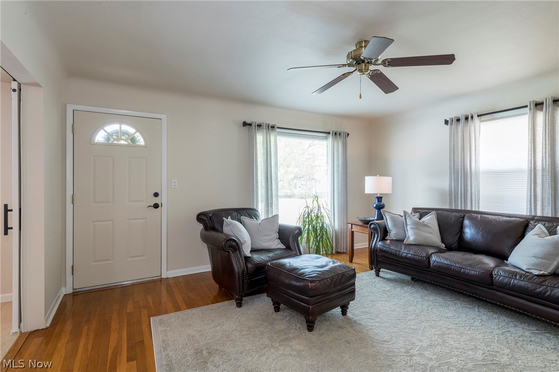 13175 McCracken Road Cleveland, OH 44125 - Photo 3 of 48 Living room with ceiling fan and hardwoo flooring