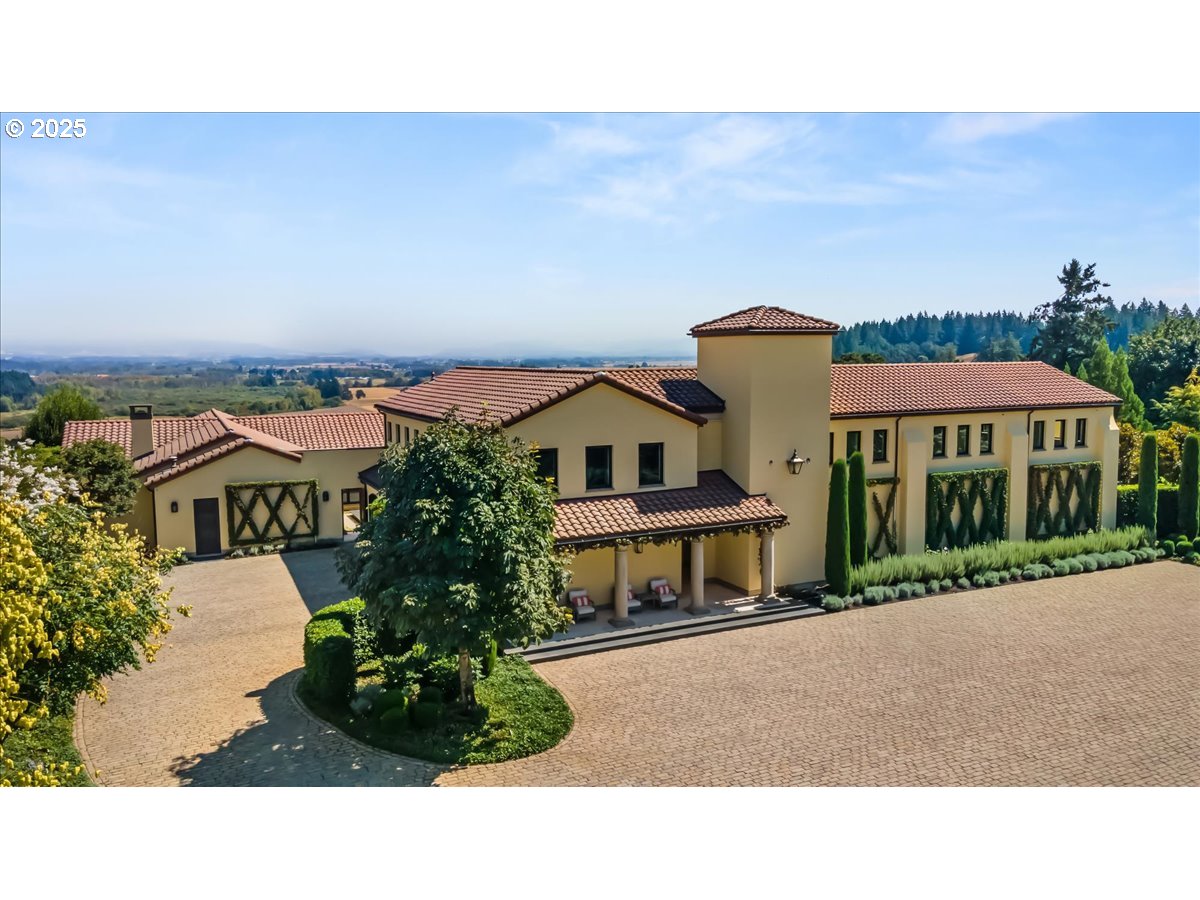 8418 Valley Way Southeast Turner, OR 97392 - Photo 2 of 48 a house view with a garden space