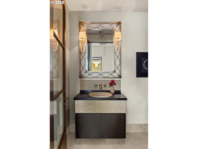 a utility room with sink dryer and washer