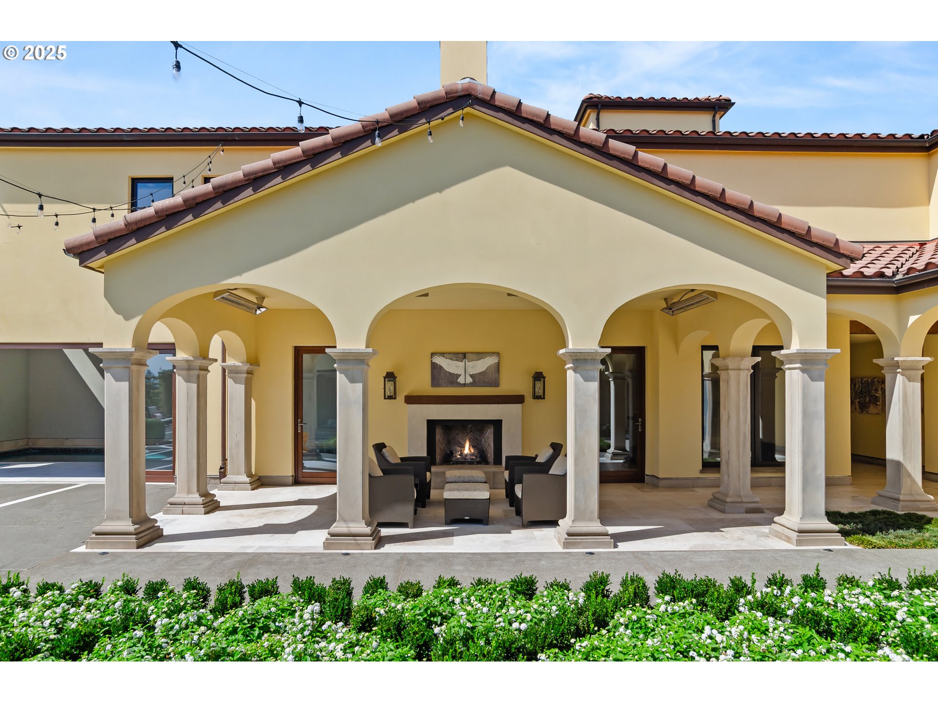 8418 Valley Way Southeast Turner, OR 97392 - Photo 32 of 48 a view of a house with large windows and a table in a patio