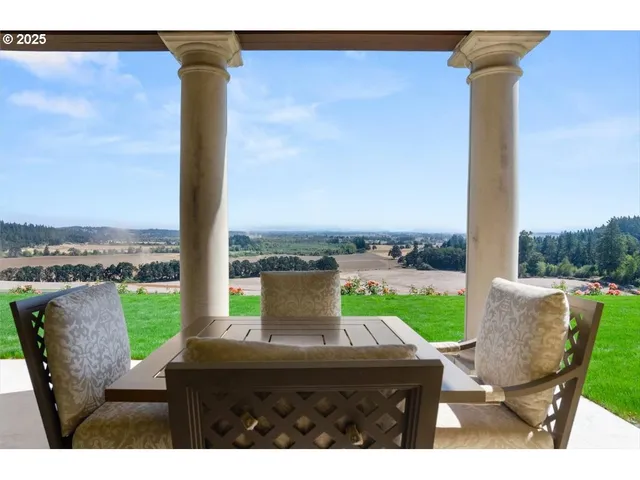 a terrace of a house with outdoor seating